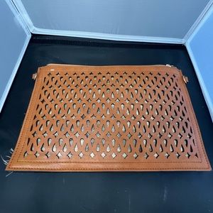 Women’s brown leather, flat purse